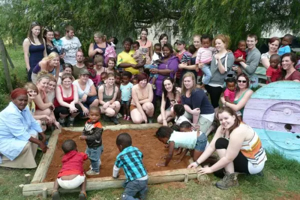 Sand pit with local children at Shamwari