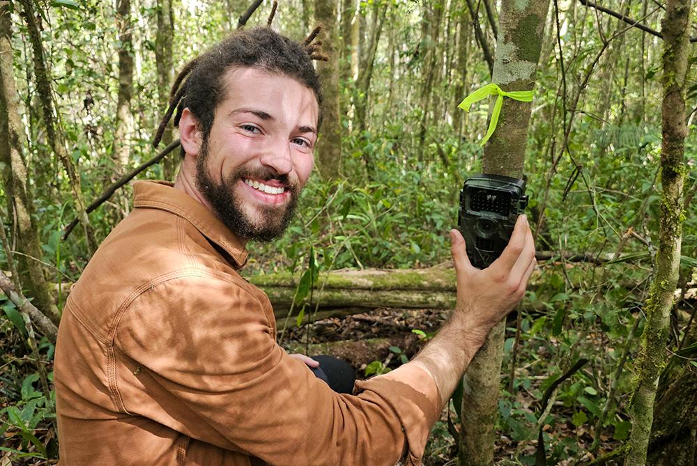 Volunteer Setting Up Camera Trap - Wildlife Conservation Volunteer Programs