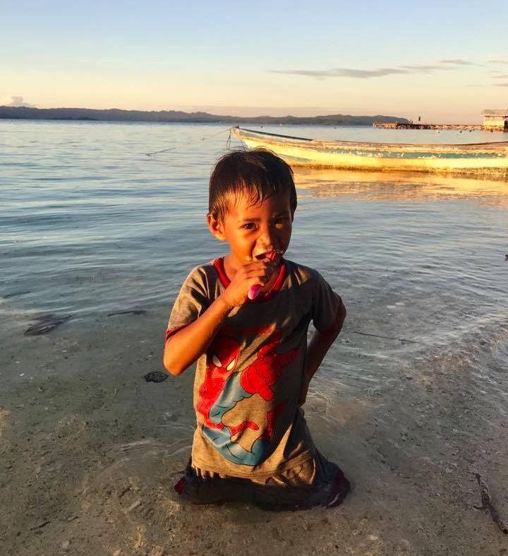 Child Brushing Teeth in Raja Ampat