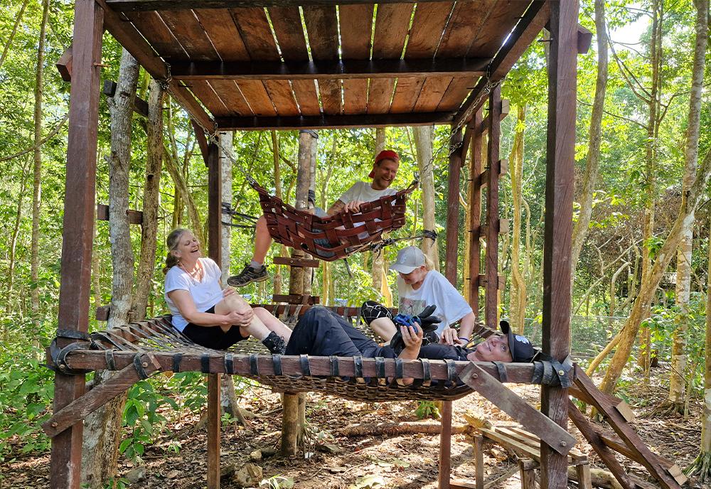 Volunteers installing new hammocks at Samboja